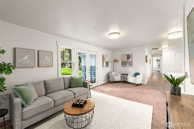 14207 6th Ave S, Burien, WA 98168 - carpeted living room featuring french doors, baseboards, and visible vents