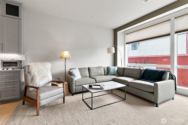708 Market St Unit 711, Tacoma, WA 98402 - living room with a toaster and visible vents