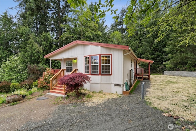 manufactured / mobile home featuring covered porch