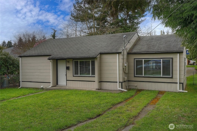 1810 S Hosmer St, Tacoma, WA 98405 - view of front of home with a front yard, a shingled roof, and fence