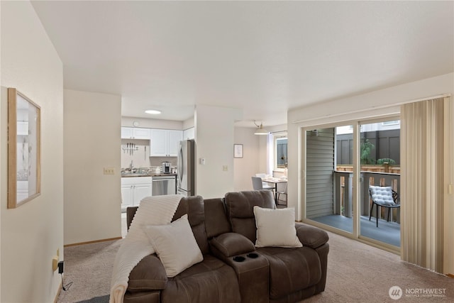18200 73rd Ave NE Unit B103, Kenmore, WA 98028 - living room featuring baseboards and light carpet