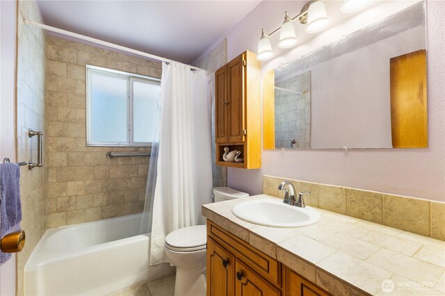full bath with vanity, shower / bathtub combination with curtain, tile patterned flooring, and toilet