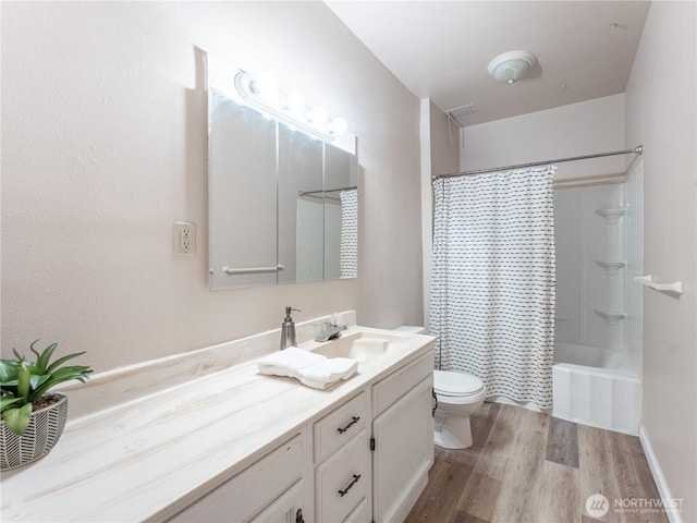 full bath with shower / bath combination with curtain, toilet, vanity, and wood finished floors