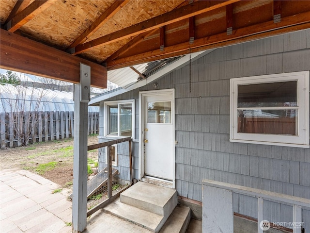 property entrance featuring fence