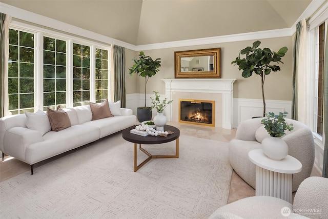19625 NE 125th Ct, Woodinville, WA 98077 - living room featuring a tile fireplace, a healthy amount of sunlight, and wainscoting