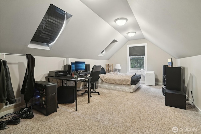 bedroom with carpet floors, baseboards, and vaulted ceiling