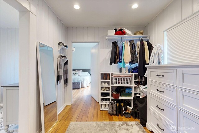 spacious closet featuring light wood-style floors