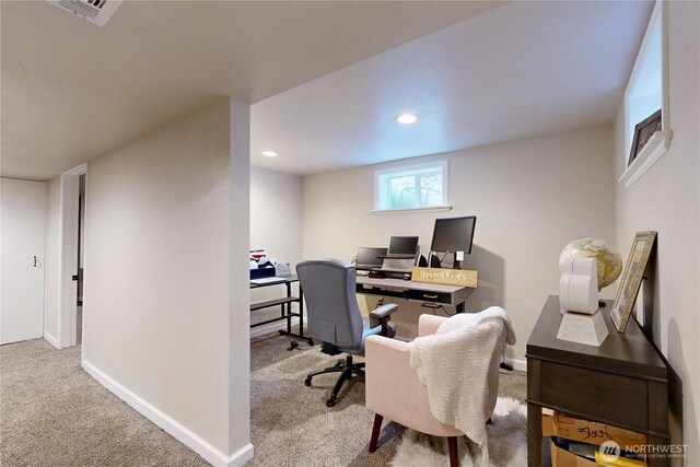 carpeted office featuring baseboards, visible vents, and recessed lighting
