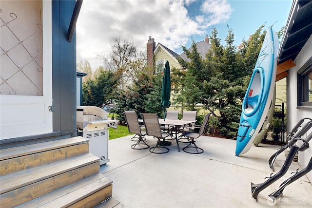 view of patio / terrace with grilling area and outdoor dining space