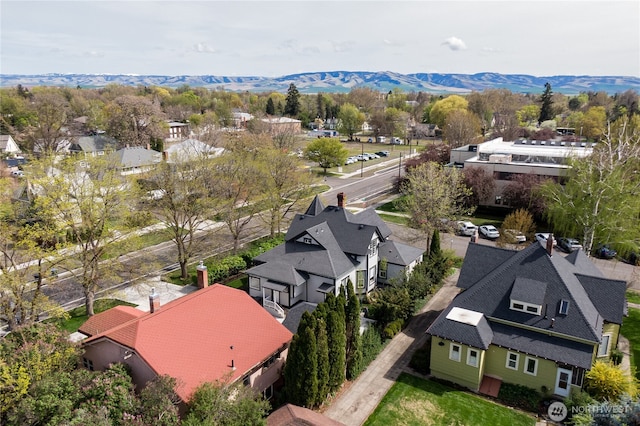 bird's eye view featuring a mountain view and a residential view