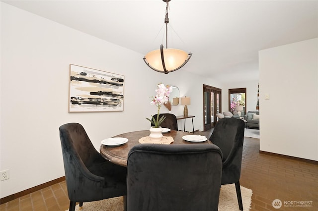 2312 W Crockett St, Seattle, WA 98199 - dining room featuring baseboards