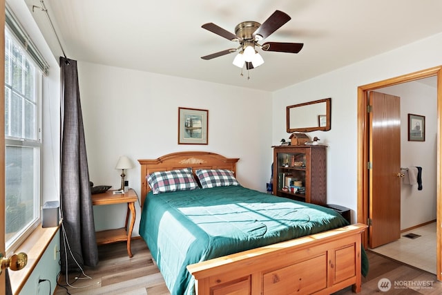 1021 Sinclair Way Unit 38, Burlington, WA 98233 - bedroom with light wood-type flooring, a ceiling fan, and visible vents