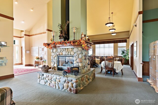 1021 Sinclair Way Unit 38, Burlington, WA 98233 - carpeted living area with baseboards and a high ceiling