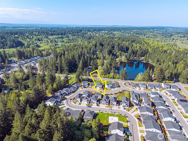 6599 SE Skipper Ln, Port Orchard, WA 98367 - aerial view featuring a water view, a residential view, and a view of trees