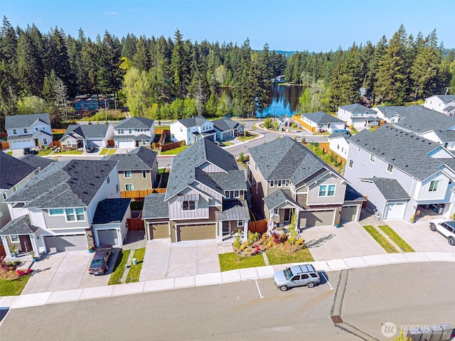 6599 SE Skipper Ln, Port Orchard, WA 98367 - drone / aerial view featuring a residential view, a water view, and a forest view