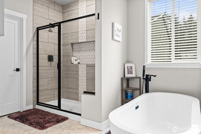 6620 165th Street Ct E, Puyallup, WA 98375 - bathroom with plenty of natural light, a shower stall, and a freestanding tub