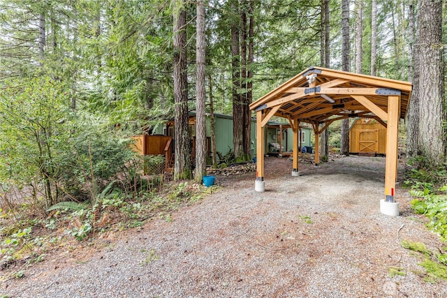 161 N Dow Mountain Rd, Hoodsport, WA 98548 - exterior space featuring a detached carport and dirt driveway
