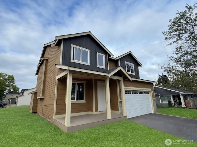 craftsman house featuring a garage, aphalt driveway, a front lawn, and board and batten siding