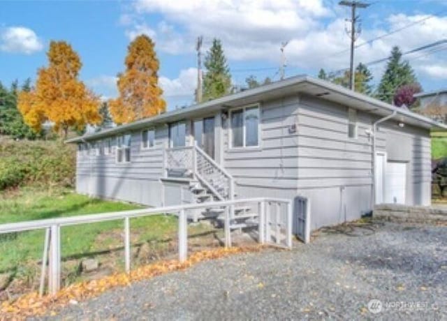 10601 55th Ave S, Seattle, WA 98178 - view of front of property featuring fence