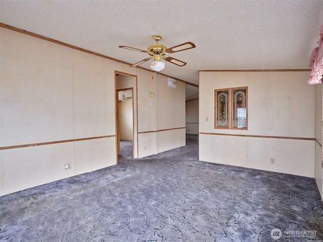 1850 Heartwood Dr, Woodland, WA 98674 - carpeted empty room featuring a ceiling fan, ornamental molding, and a textured ceiling