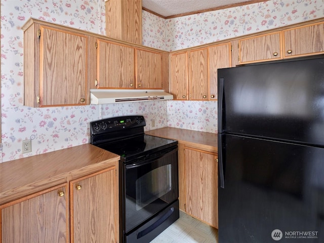 1850 Heartwood Dr, Woodland, WA 98674 - kitchen with wallpapered walls, black appliances, ventilation hood, and light floors