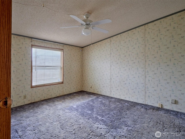 1850 Heartwood Dr, Woodland, WA 98674 - carpeted empty room featuring wallpapered walls, crown molding, ceiling fan, and a textured ceiling