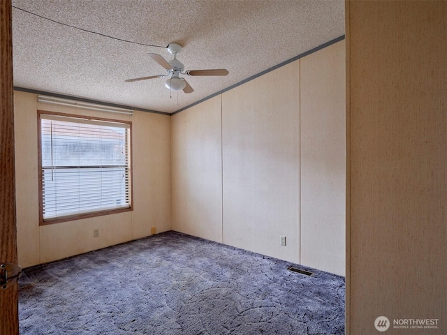 1850 Heartwood Dr, Woodland, WA 98674 - spare room featuring visible vents, a textured ceiling, carpet, and a ceiling fan