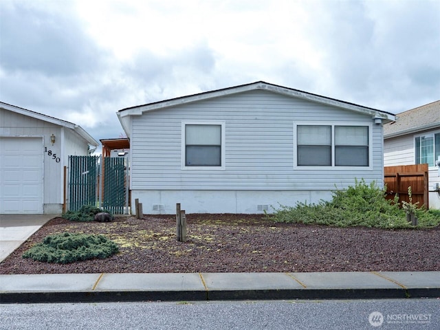 1850 Heartwood Dr, Woodland, WA 98674 - view of front of property featuring driveway, fence, and crawl space