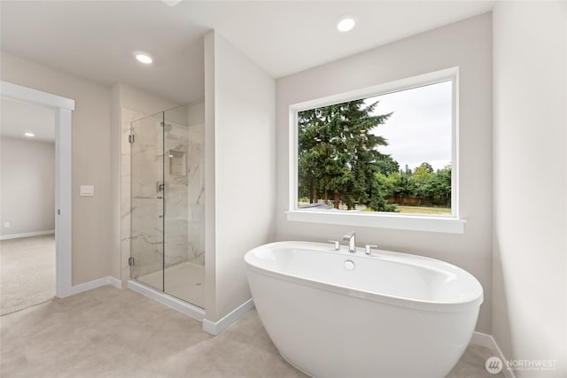 11519 SE 84th St Unit 44, Newcastle, WA 98056 - full bath with a freestanding bath, a marble finish shower, and recessed lighting