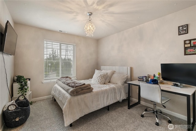 bedroom featuring baseboards, a notable chandelier, visible vents, and carpet flooring