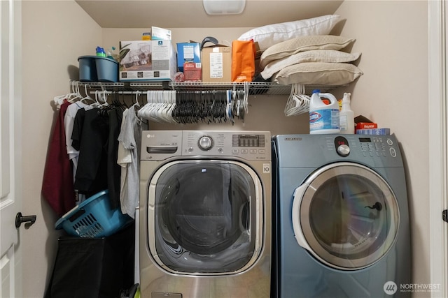 laundry area with laundry area and washer and dryer