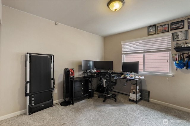 office featuring baseboards and carpet