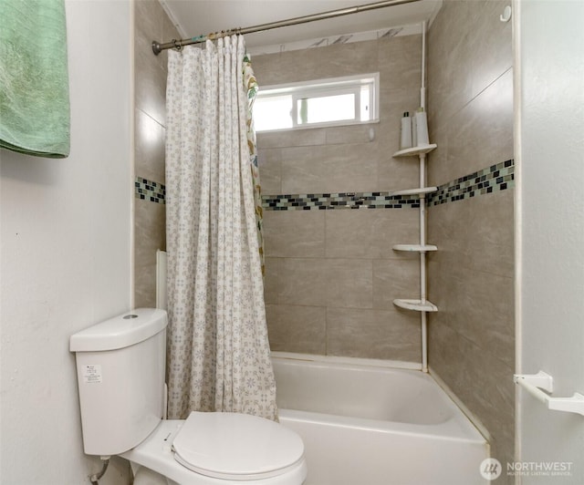 full bathroom featuring shower / bath combination with curtain and toilet