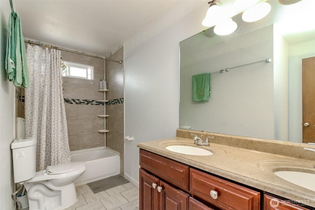 full bathroom featuring toilet, a sink, double vanity, and shower / bath combo