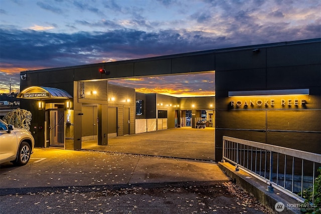 view of property at dusk