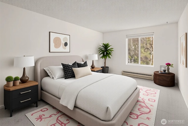 10501 8th Ave NE Unit 210, Seattle, WA 98125 - bedroom with a baseboard radiator, a textured ceiling, and light colored carpet