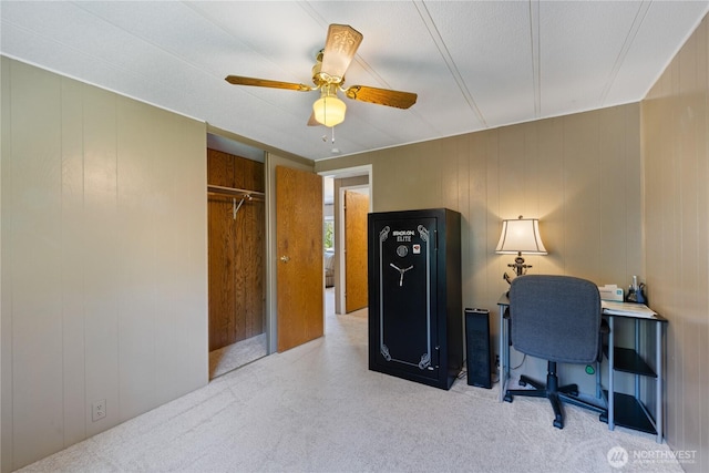 office featuring carpet flooring and ceiling fan