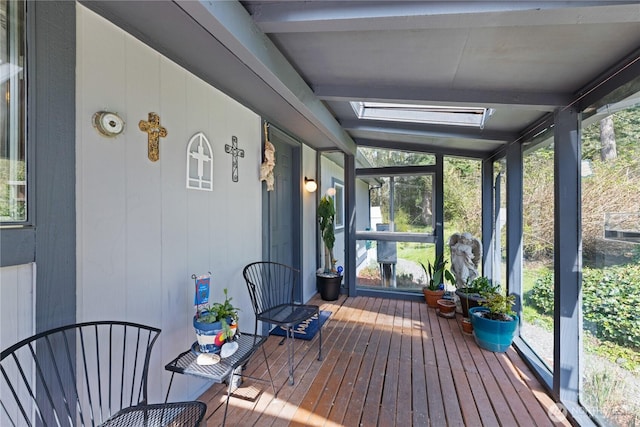 sunroom / solarium featuring a skylight
