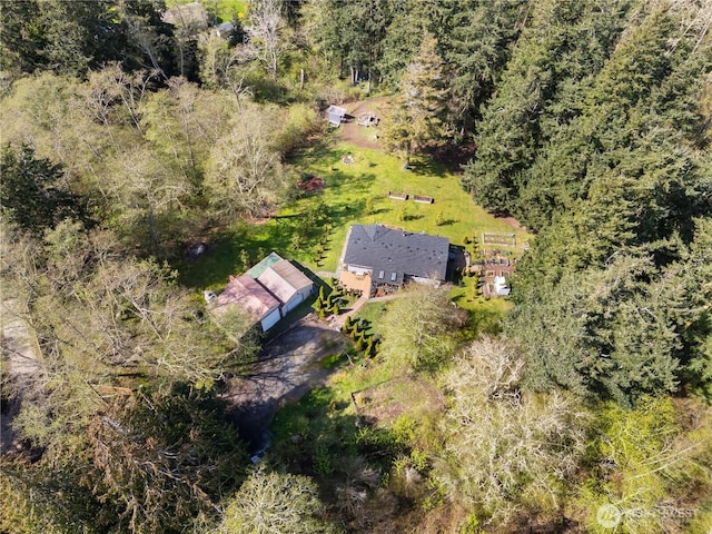 aerial view featuring a forest view
