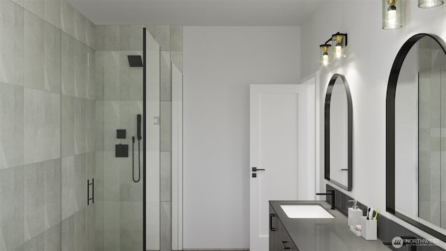bathroom with vanity and a shower stall