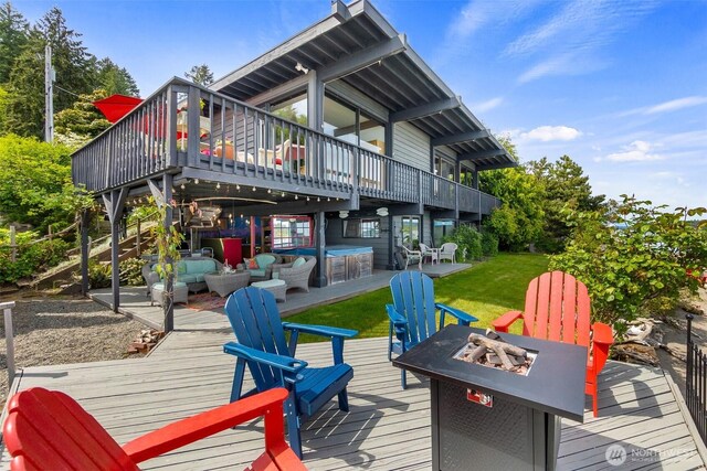9716 Hunter Point Rd NW, Olympia, WA 98502 - wooden terrace with an outdoor living space with a fire pit and a hot tub