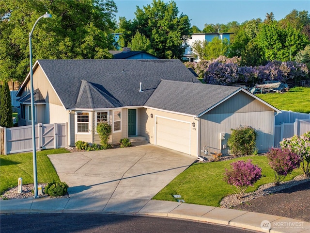 ranch-style home with a front yard, a gate, fence, and a garage