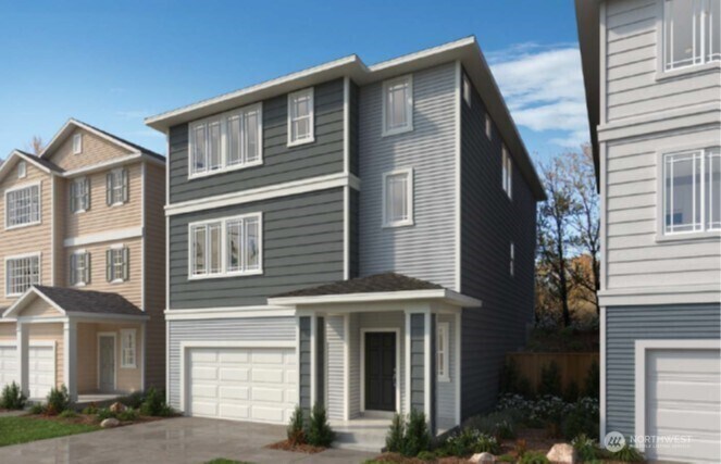 1432 121st Ave SE Unit 33, Lake Stevens, WA 98258 - view of front facade with driveway and an attached garage