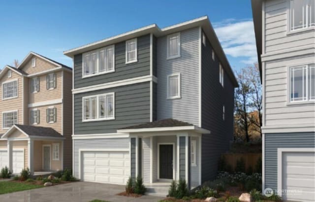 1432 121st Ave SE Unit 33, Lake Stevens, WA 98258 - view of front facade with driveway and an attached garage