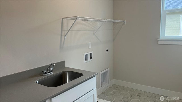 6406 213th Avenue Ct E, Bonney Lake, WA 98391 - washroom with cabinet space, hookup for a washing machine, light tile patterned flooring, electric dryer hookup, and baseboards