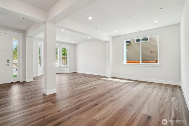 6406 213th Avenue Ct E, Bonney Lake, WA 98391 - unfurnished living room featuring wood finished floors and recessed lighting