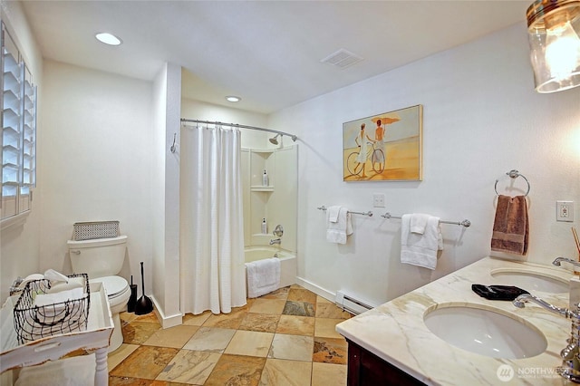 987 Cavalero Rd, Camano Island, WA 98282 - bathroom featuring a baseboard heating unit, toilet, a sink, and visible vents