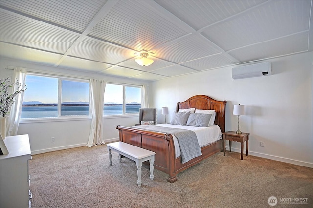 987 Cavalero Rd, Camano Island, WA 98282 - bedroom with an AC wall unit, light colored carpet, and baseboards