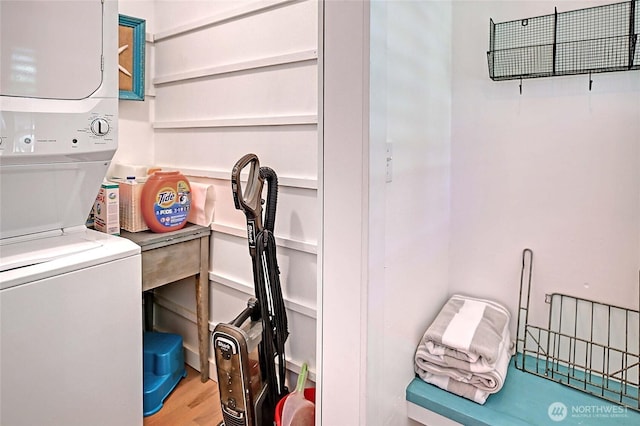 987 Cavalero Rd, Camano Island, WA 98282 - laundry room with laundry area, stacked washing maching and dryer, and wood finished floors