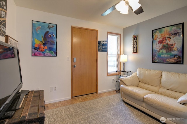 192 Canal Dr NE, Ocean Shores, WA 98569 - living area with ceiling fan and baseboards